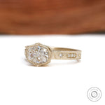 Art deco engagement ring with bezel set cushion moissanite thick gold band