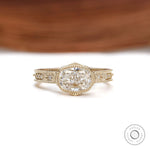Vintage art deco cushion moissanite engagement ring with milgrain bezel and starburst design