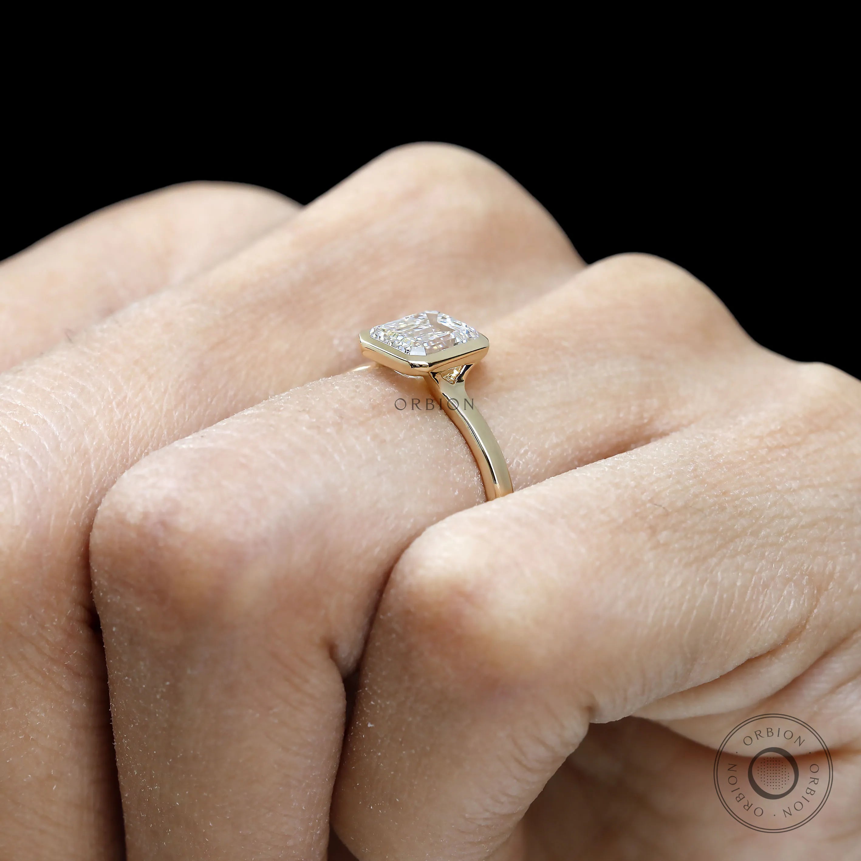 1.50 ct Emerald cut lab diamond ring with modern bezel design