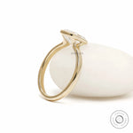 Bezel set emerald cut lab diamond ring with clean modern design