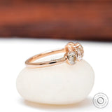 Side view of bezel set five stone rose gold band