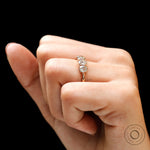 Five stone moissanite half eternity band on hand front view