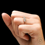 Five stone moissanite half eternity band on hand front view