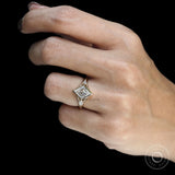 Geometric style moissanite engagement ring with lozenge cut and yellow gold split shank