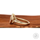 14k Yellow gold engagement ring with bezel set lozenge moissanite and kite accents