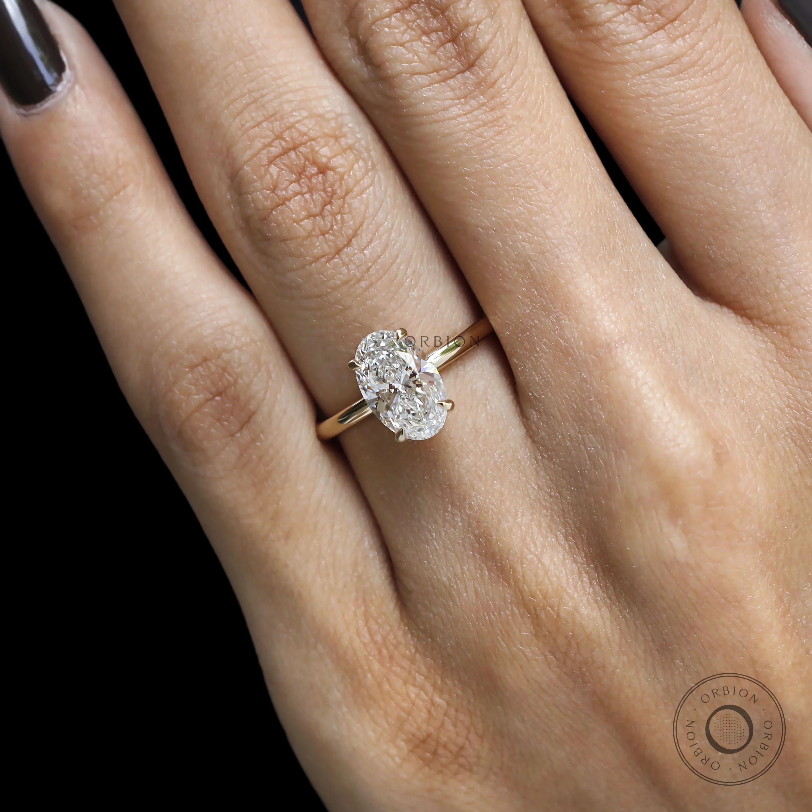 Oval solitaire engagement 4 prong ring yellow gold 