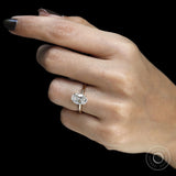 2 Carat oval shaped lab grown diamond engagement ring with hidden halo and yellow gold band