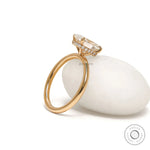 2 CT oval cut lab grown diamond hidden halo engagement ring in 18k yellow gold