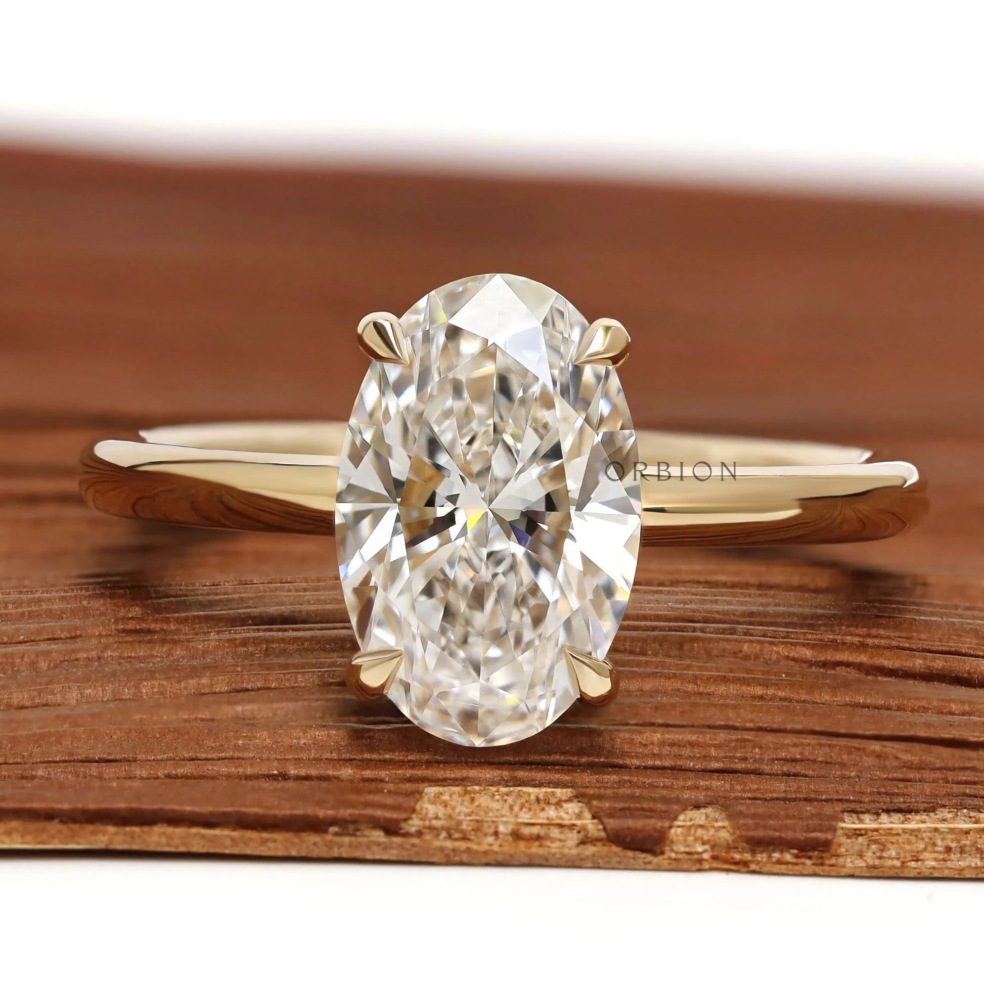 Hidden halo 2 CT oval cut lab grown diamond engagement ring with yellow gold band