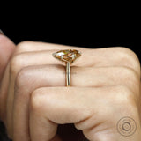 Tulip set engagement ring with pear dark champagne moissanite in 18k yellow gold