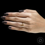 Tulip inspired floral bridge ring with pear champagne moissanite, 18k yellow gold
