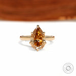 Tulip set pear dark champagne moissanite ring with floral bridge design in 18k yellow gold