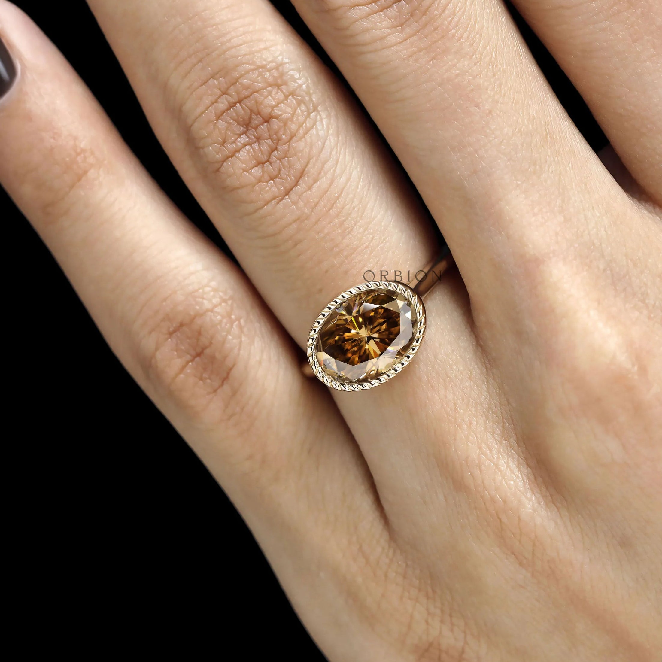 Tulip inspired East West oval moissanite ring, dark champagne stone, rope bezel, yellow gold