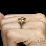 East West dark champagne moissanite oval cocktail ring with tulip set and cathedral 18k gold band