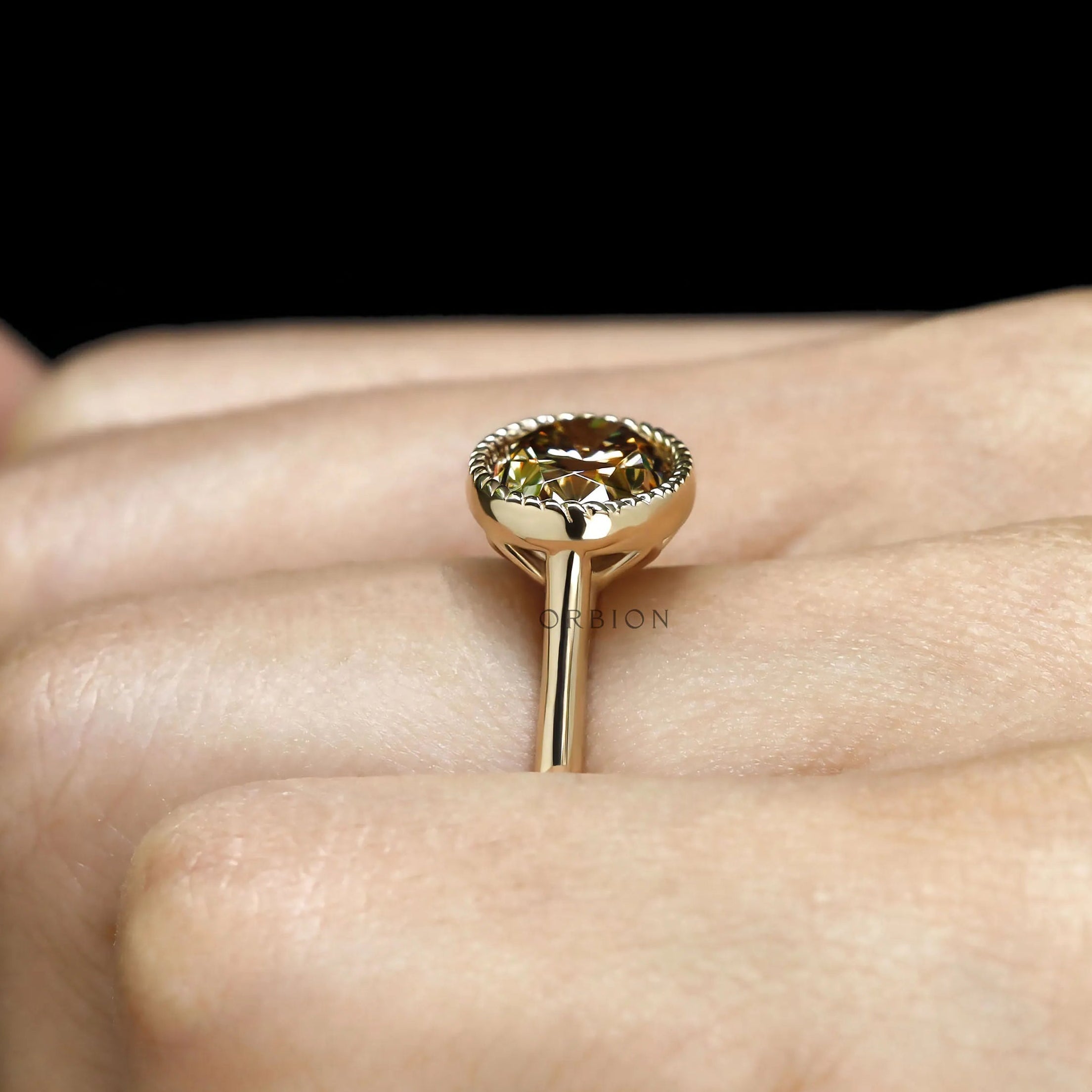 East West dark champagne moissanite oval cocktail ring with tulip set and cathedral 18k gold band