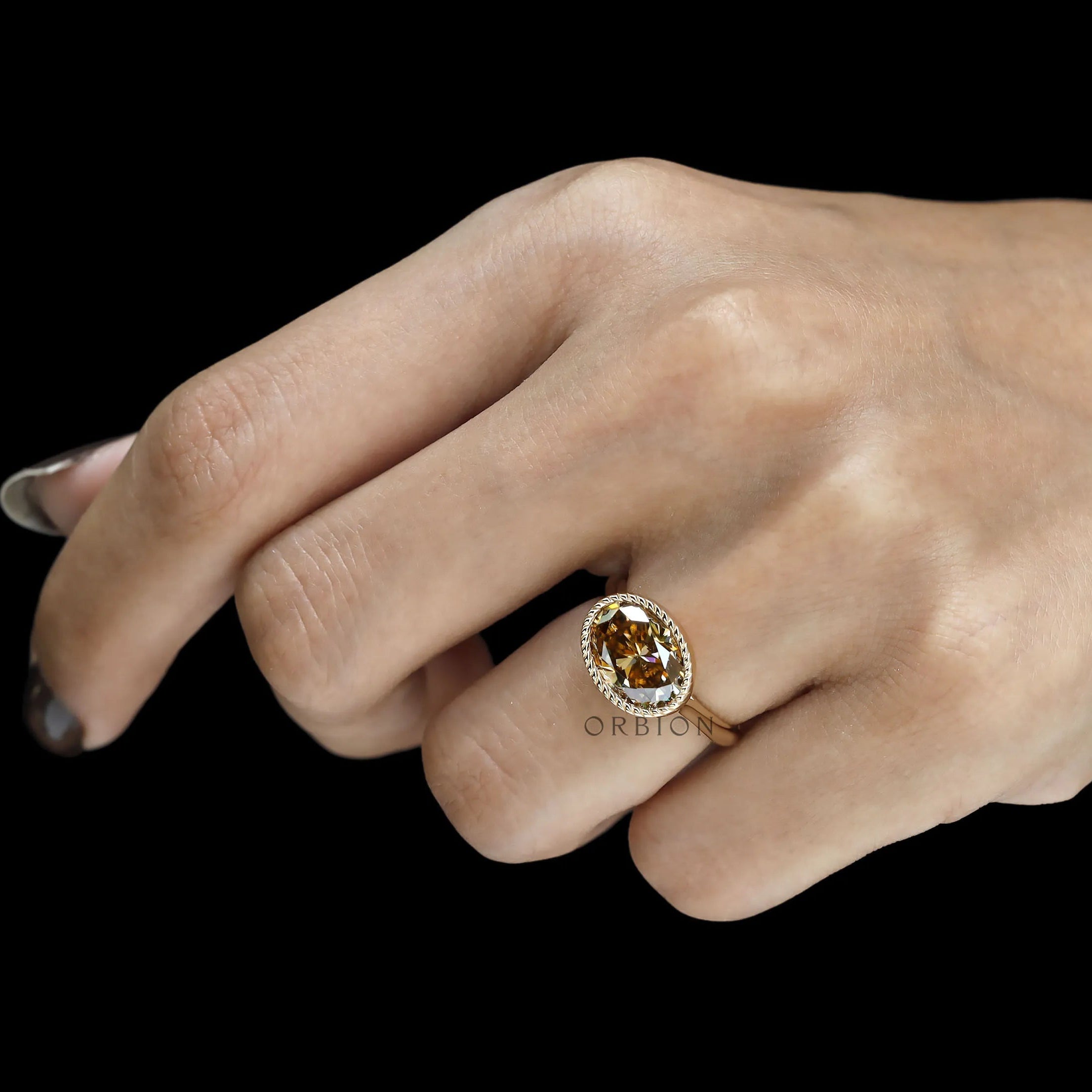 Unique East West orientation oval dark champagne moissanite ring, tulip set, 18k yellow gold