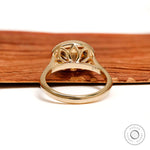 Oval dark champagne moissanite East West ring with tulip design, rope bezel, 18k yellow gold