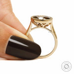 18k yellow gold East West moissanite cocktail ring, dark champagne oval, tulip set with cathedral band