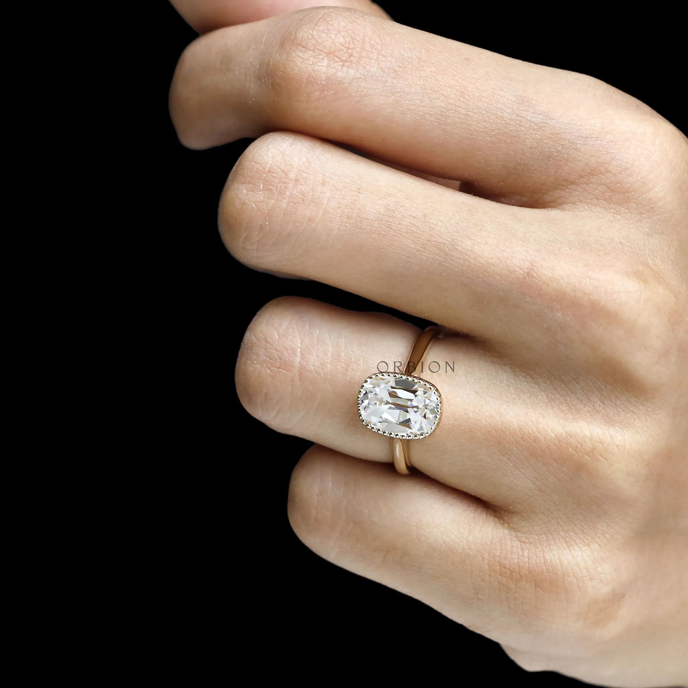 Elongated cushion moissanite ring, OMC, vintage style, 10k yellow gold cathedral with milgrain bezel
