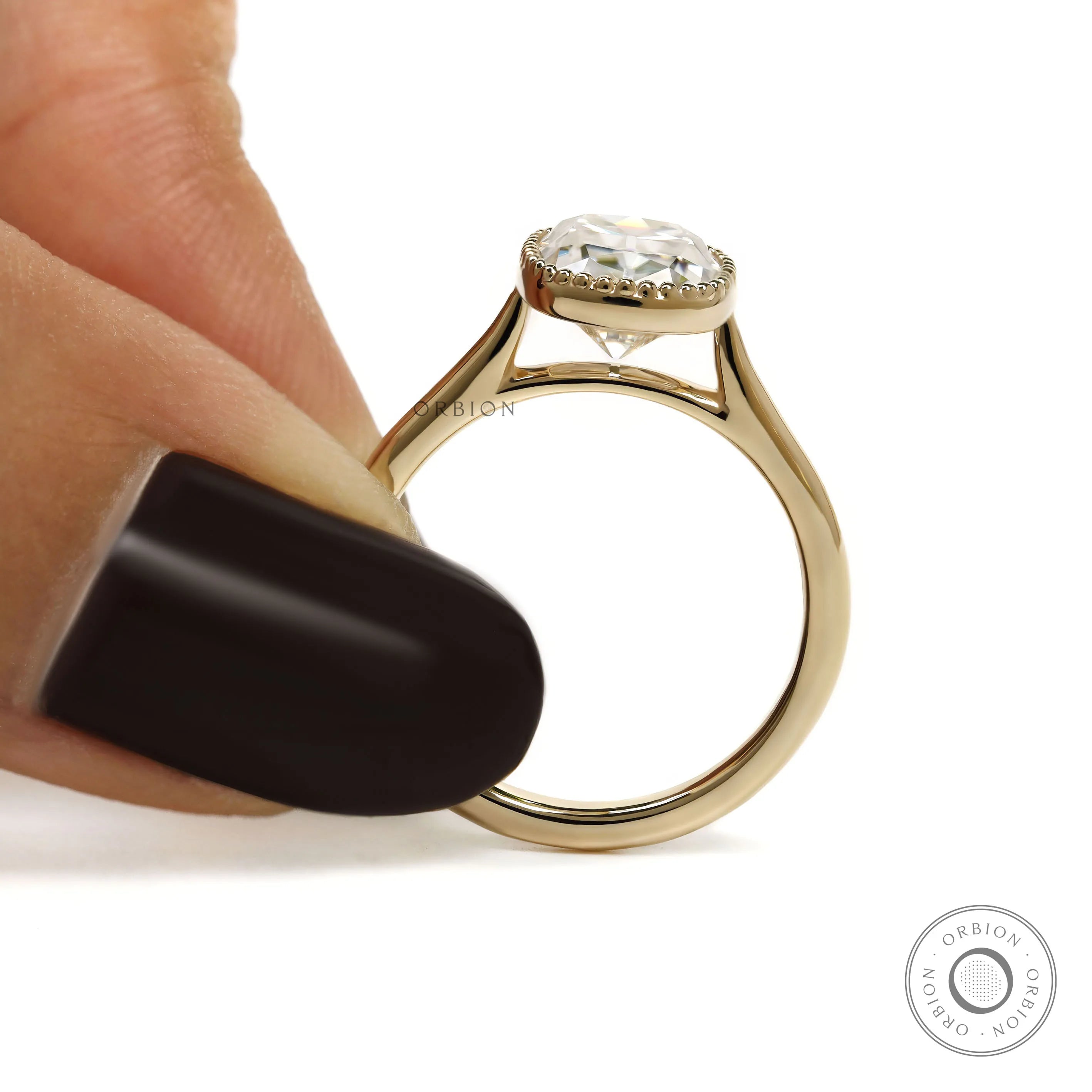 Elongated cushion OMC moissanite ring with milgrain bezel, 10k yellow gold cathedral