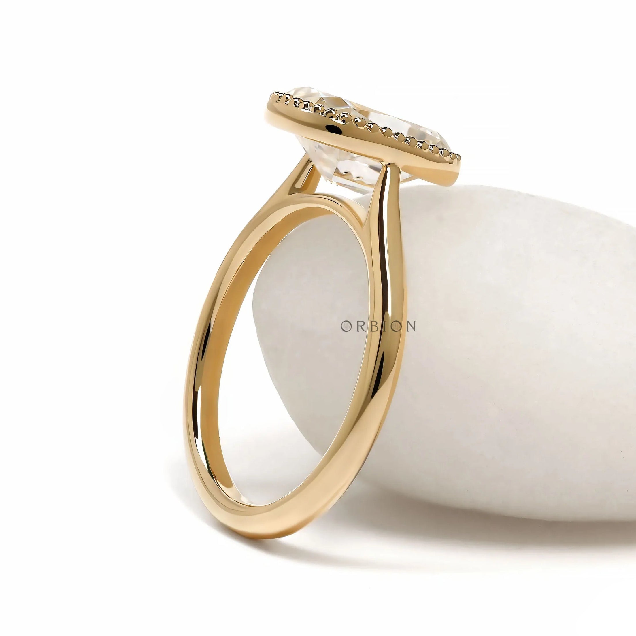 10k yellow gold cathedral elongated cushion moissanite milgrain bezel ring