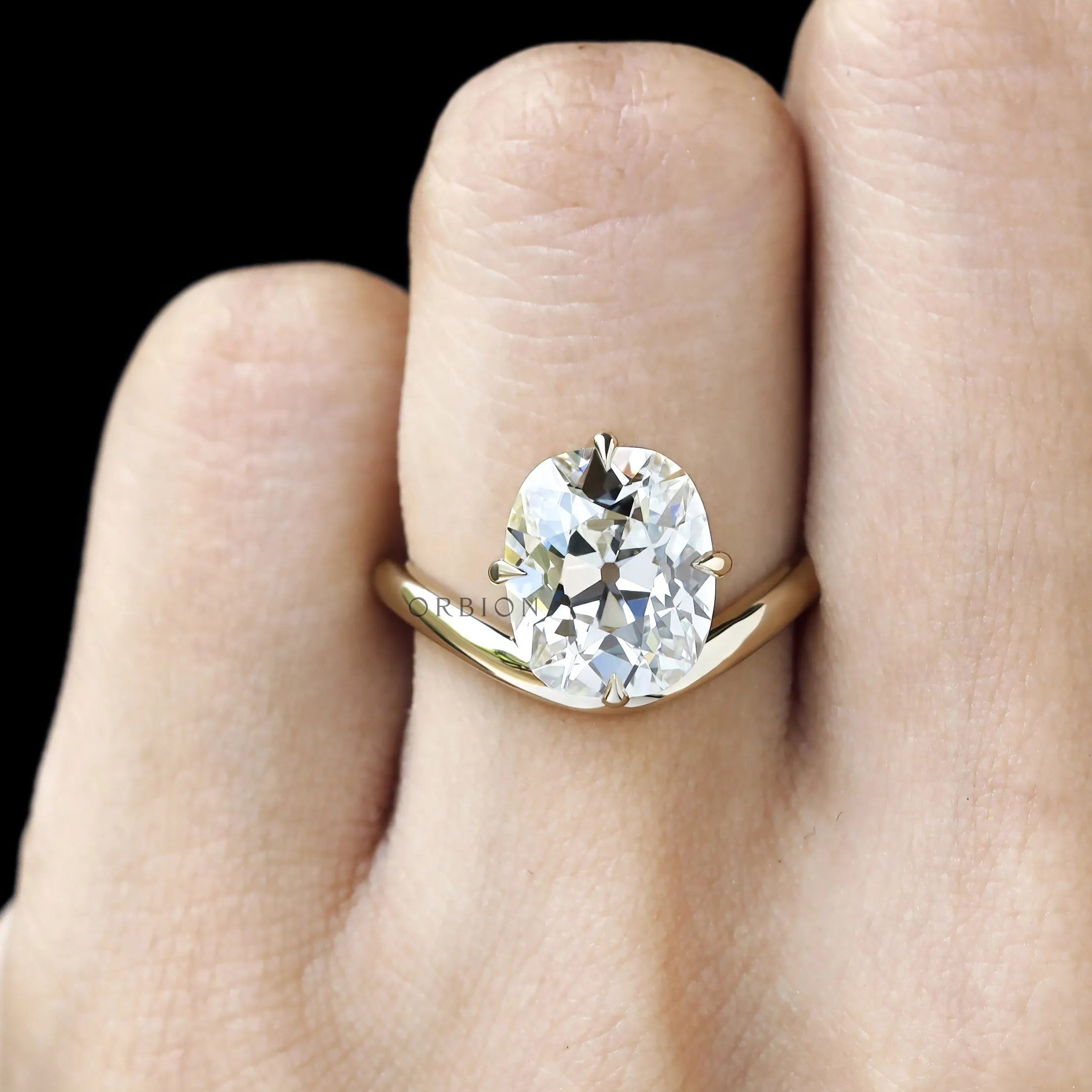 Bypass elongated cushion lab diamond ring compass setting yellow gold