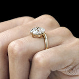 Curved 14k yellow gold bypass ring with old mine cushion lab diamond, compass setting
