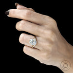 Elongated cushion cut lab diamond ring with curved bypass shank, compass setting, yellow gold