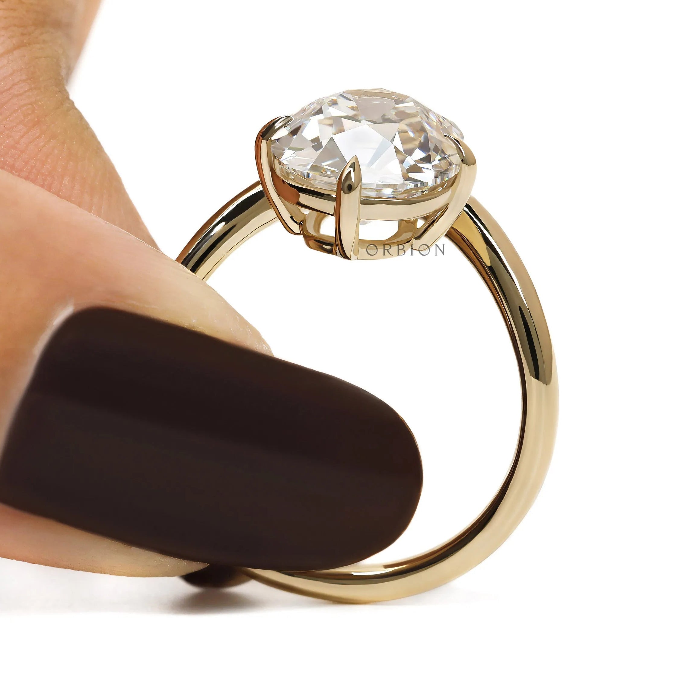 Yellow gold curved bypass ring showcasing old mine cushion lab diamond for engagement