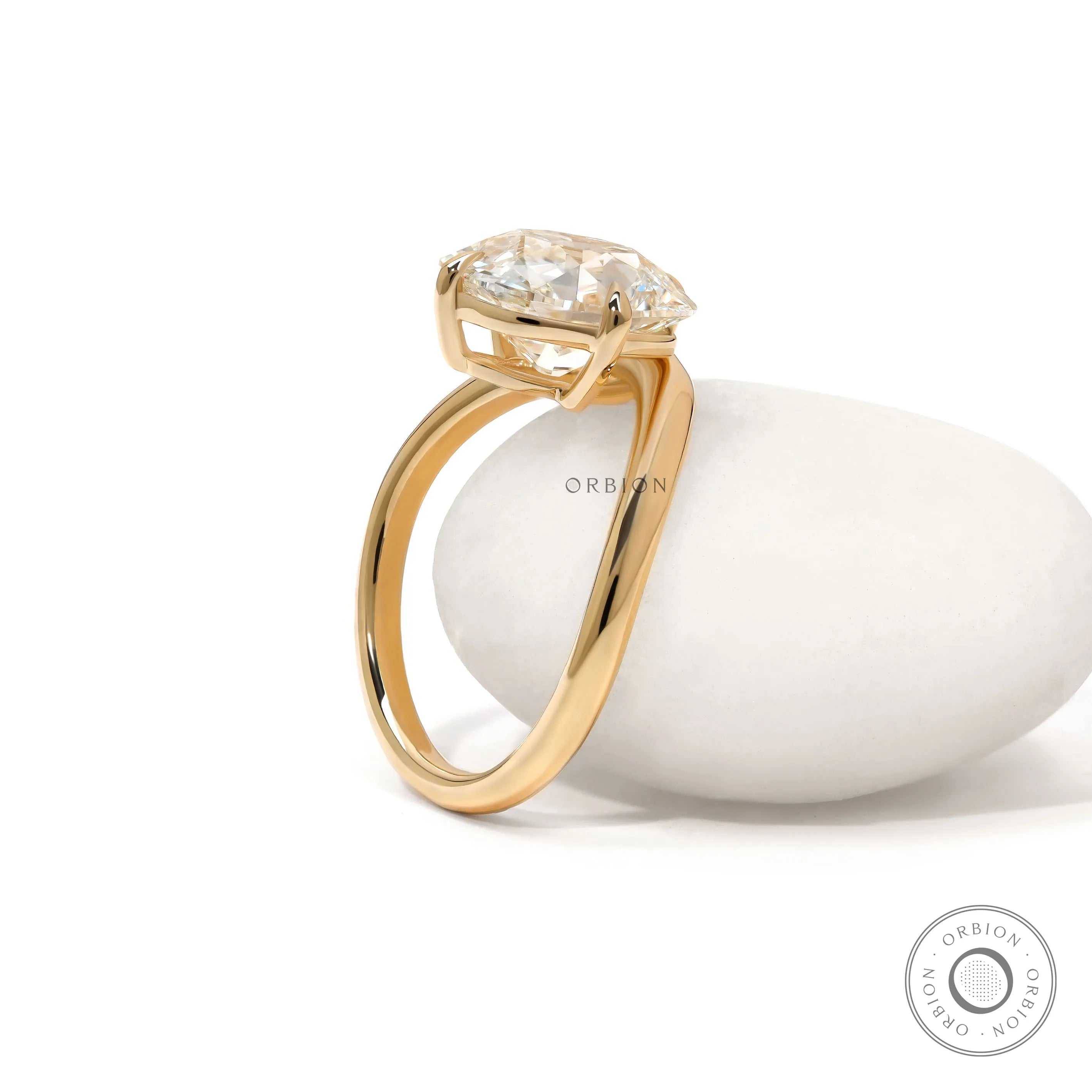 Curved bypass engagement ring with elongated cushion lab diamond in 14k yellow gold