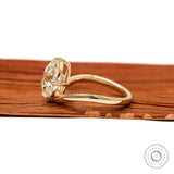 Elegant old mine cushion lab diamond ring in a curved bypass 14k yellow gold setting
