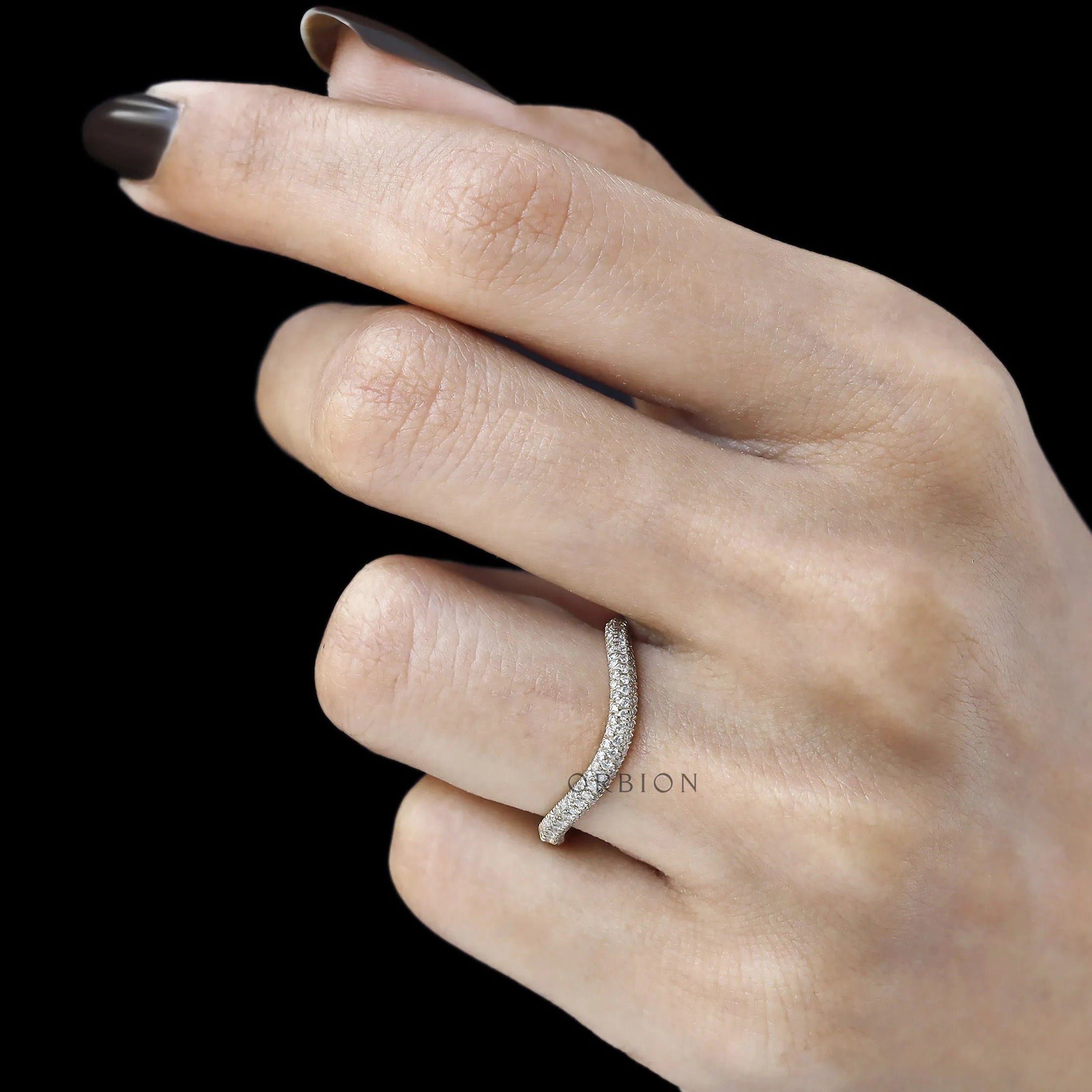 Half-eternity stacking band featuring pave-set lab diamonds or moissanite in 14k yellow gold