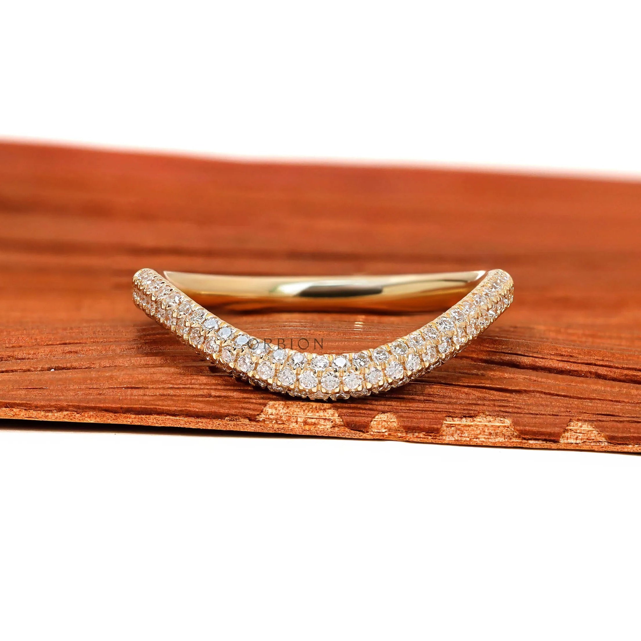 14k yellow gold curved stacking band with three rows of pave set lab diamonds or moissanite