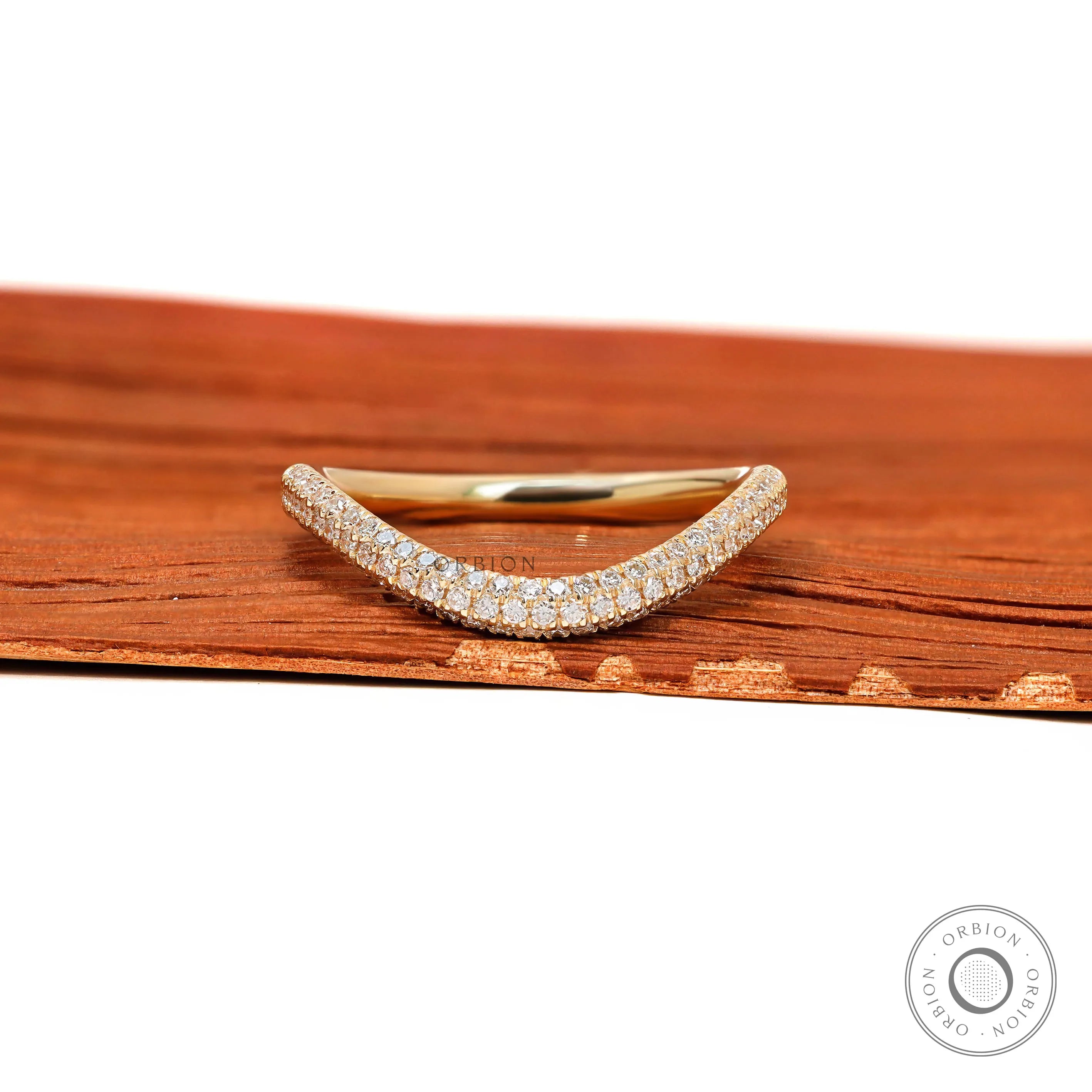 14k yellow gold curved stacking band with three rows of pave set lab diamonds or moissanite