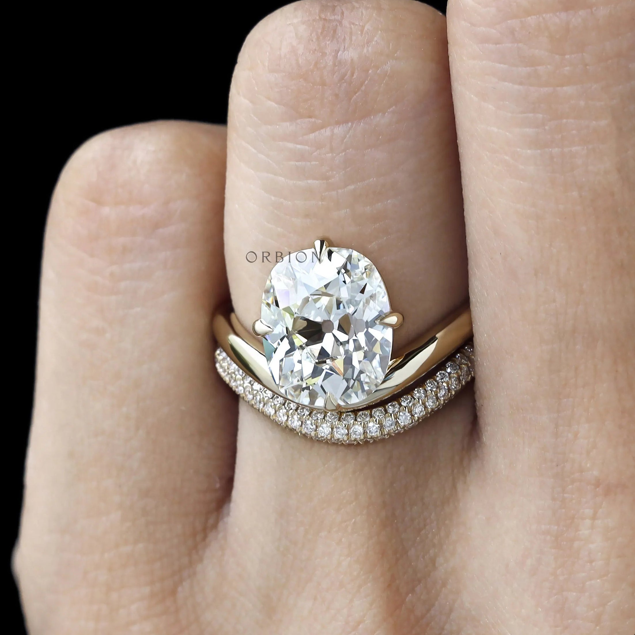 Engagement ring set with curved cushion lab diamond or moissanite, compass setting