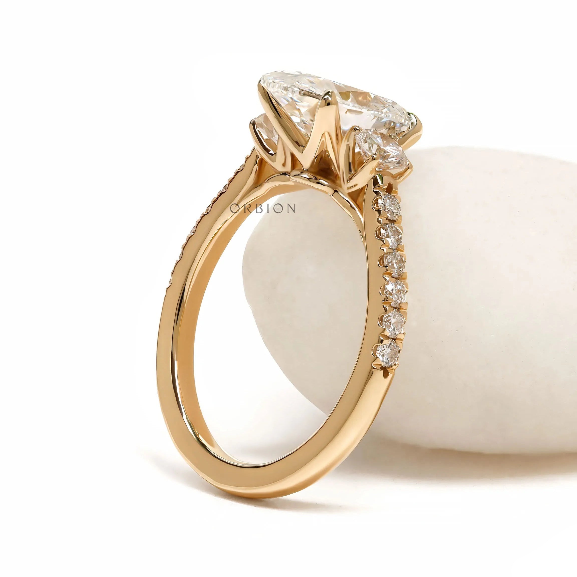 Three stone oval lab diamond engagement ring in 14k yellow gold, pave shank, moissanite alternative