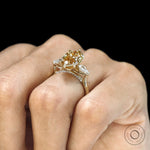 Tulip and kite set marquise moissanite three stone ring in 10k yellow gold, accented bridge design