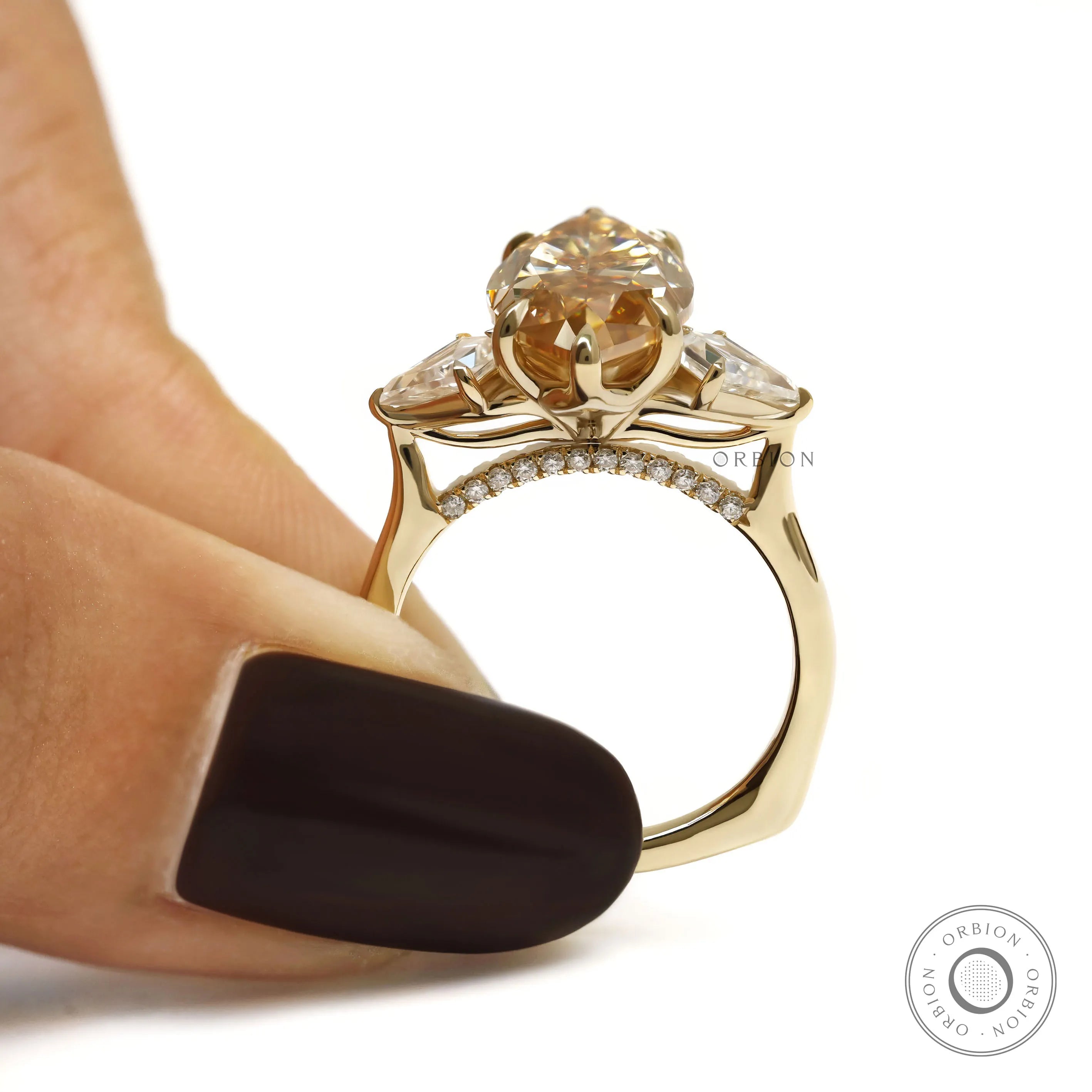 Tulip set marquise champagne moissanite three stone ring with kite side stones in 10k yellow gold