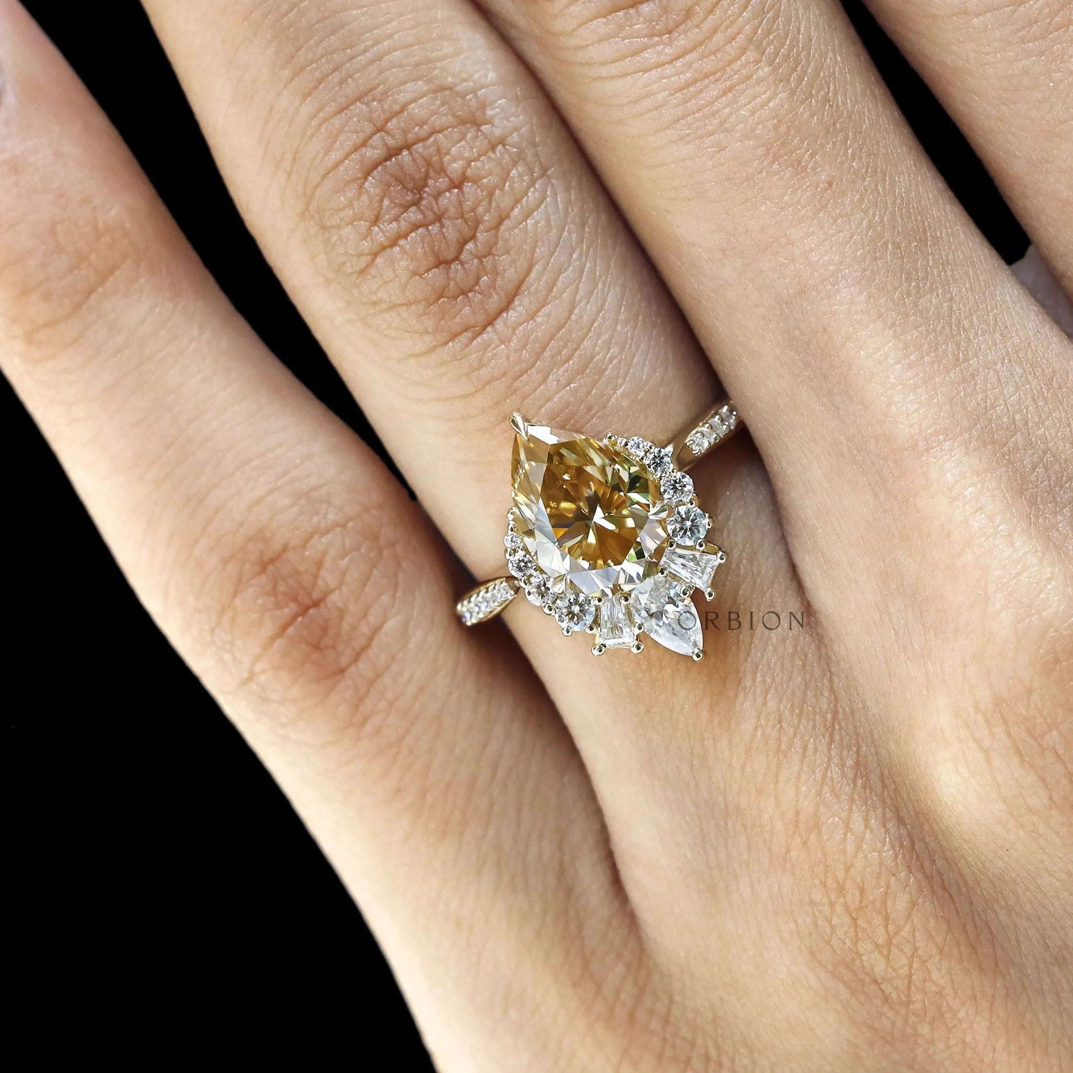 Half Halo Pear Moissanite Engagement Ring in 10k Gold