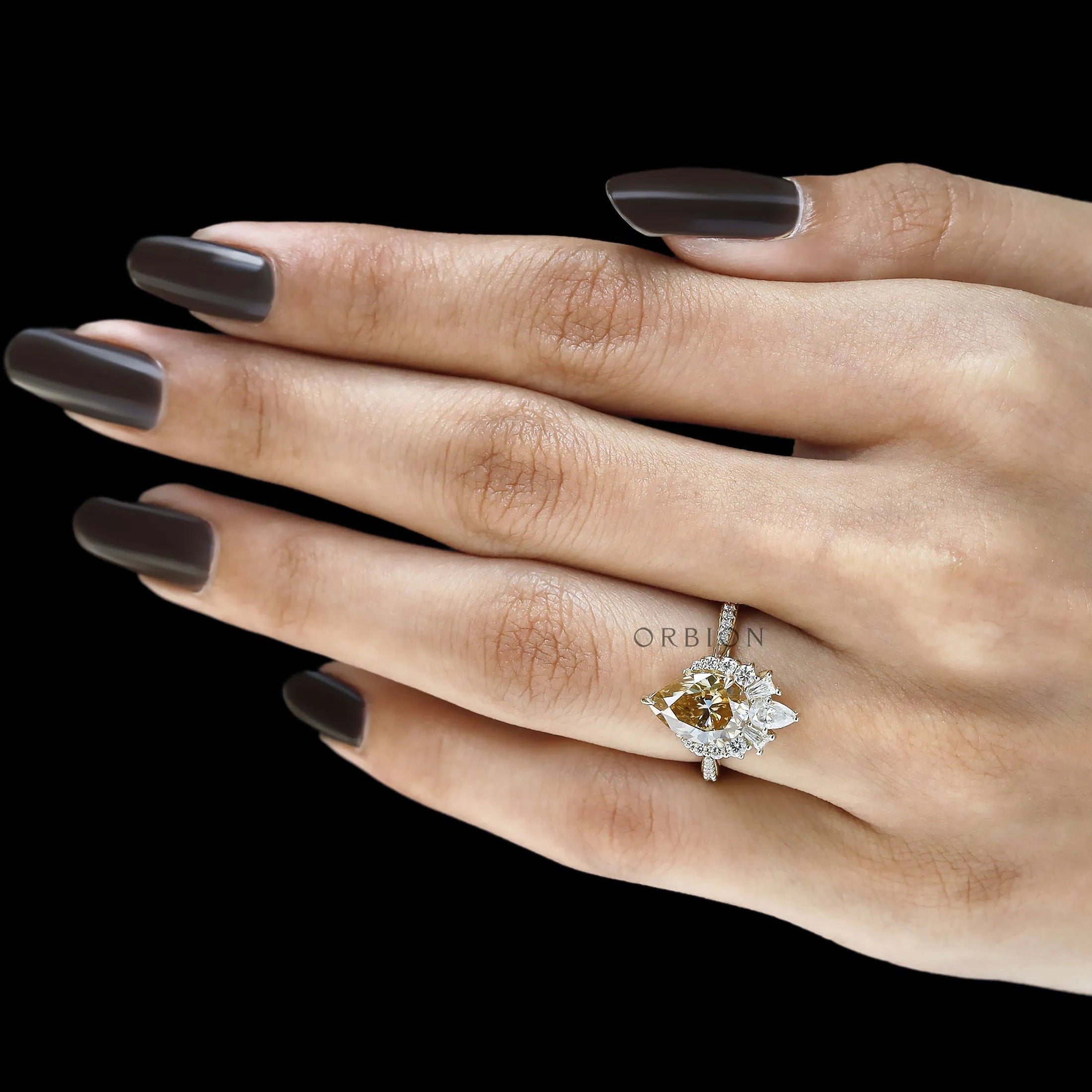 Statement Pear Moissanite Cluster Engagement Ring in Half Halo Design