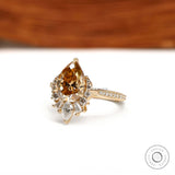 Pave Euro Shank Engagement Ring Featuring Pear Champagne Moissanite Center Stone