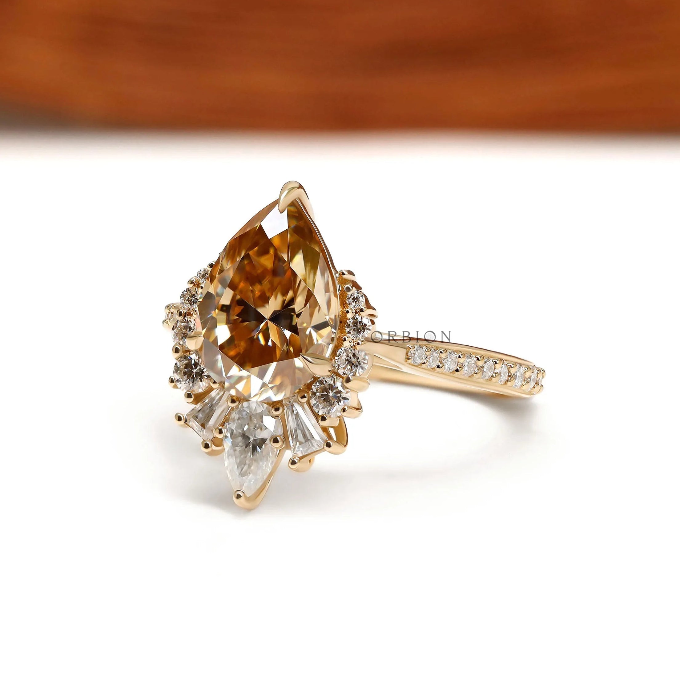 Pave Euro Shank Engagement Ring Featuring Pear Champagne Moissanite Center Stone