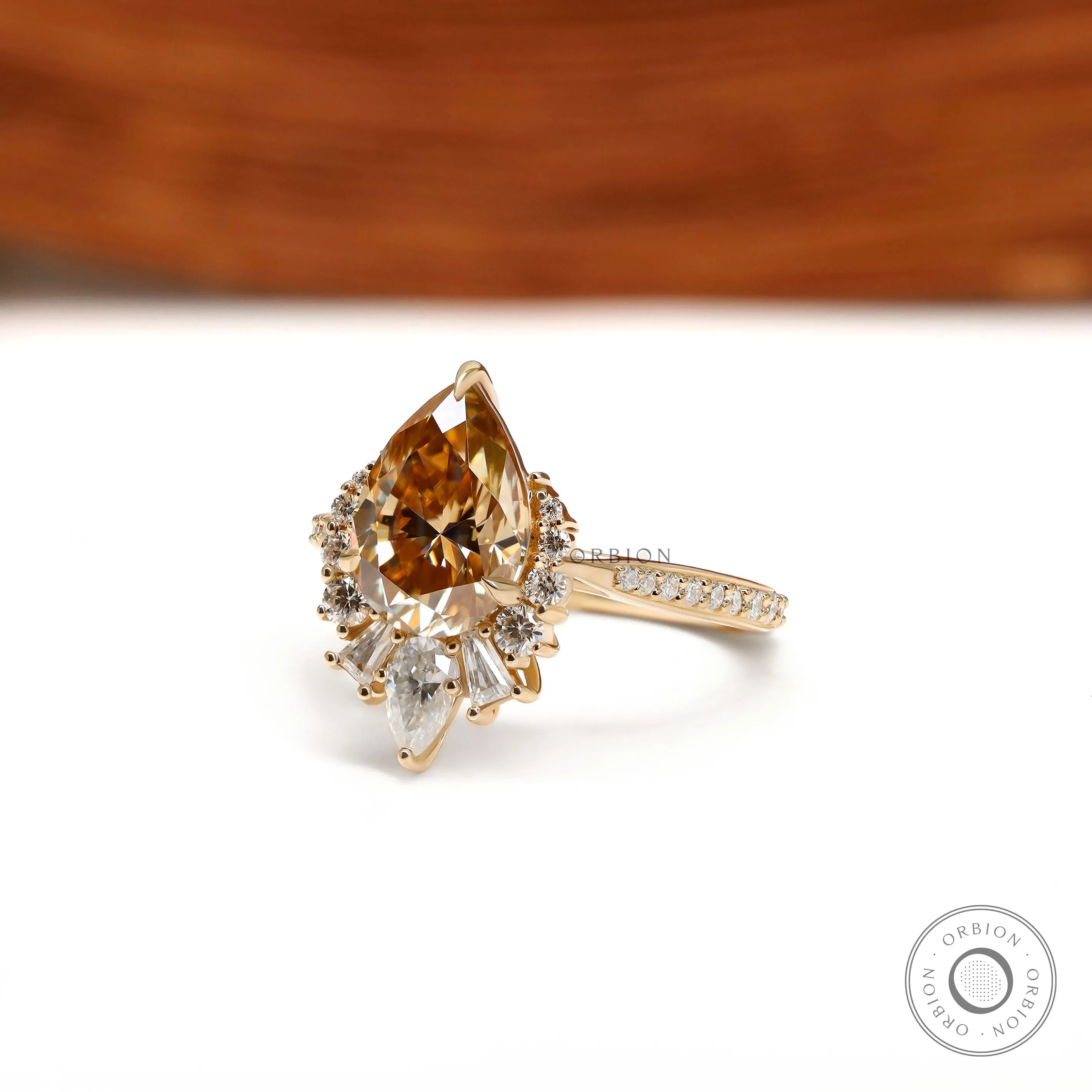 Pave Euro Shank Engagement Ring Featuring Pear Champagne Moissanite Center Stone