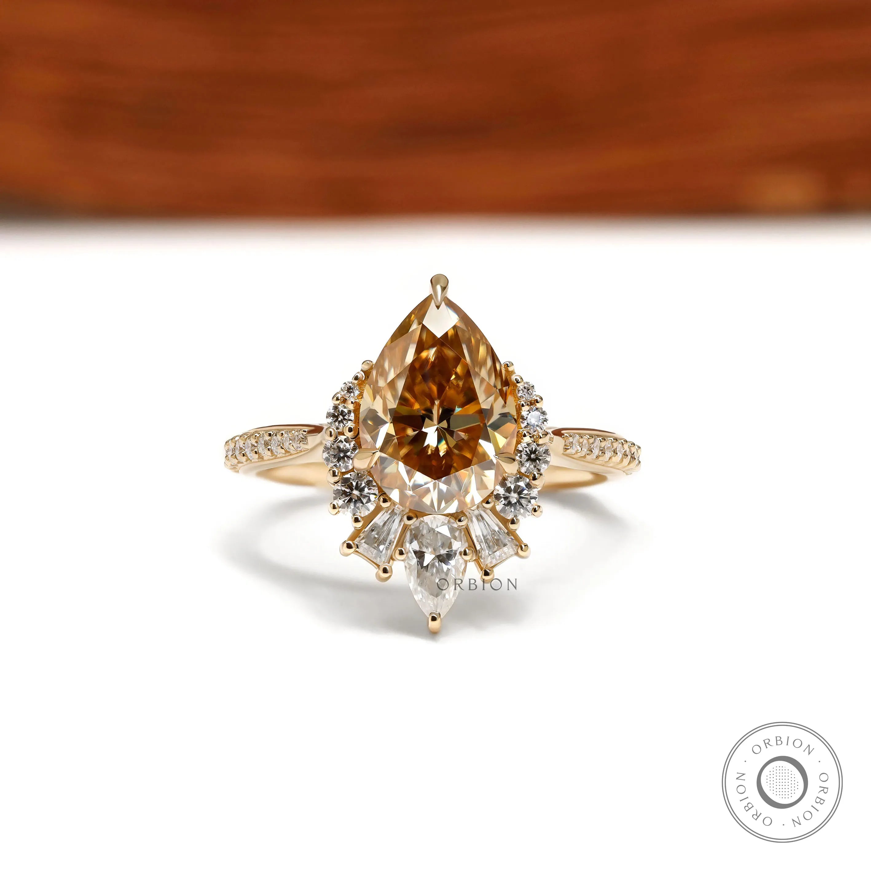 Pear Champagne Moissanite Half Halo Cluster Engagement Ring with Pave Euro Shank in 10k Yellow Gold