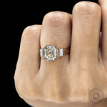 Elegant elongated asscher engagement ring with geometric baguette side stones in rose gold