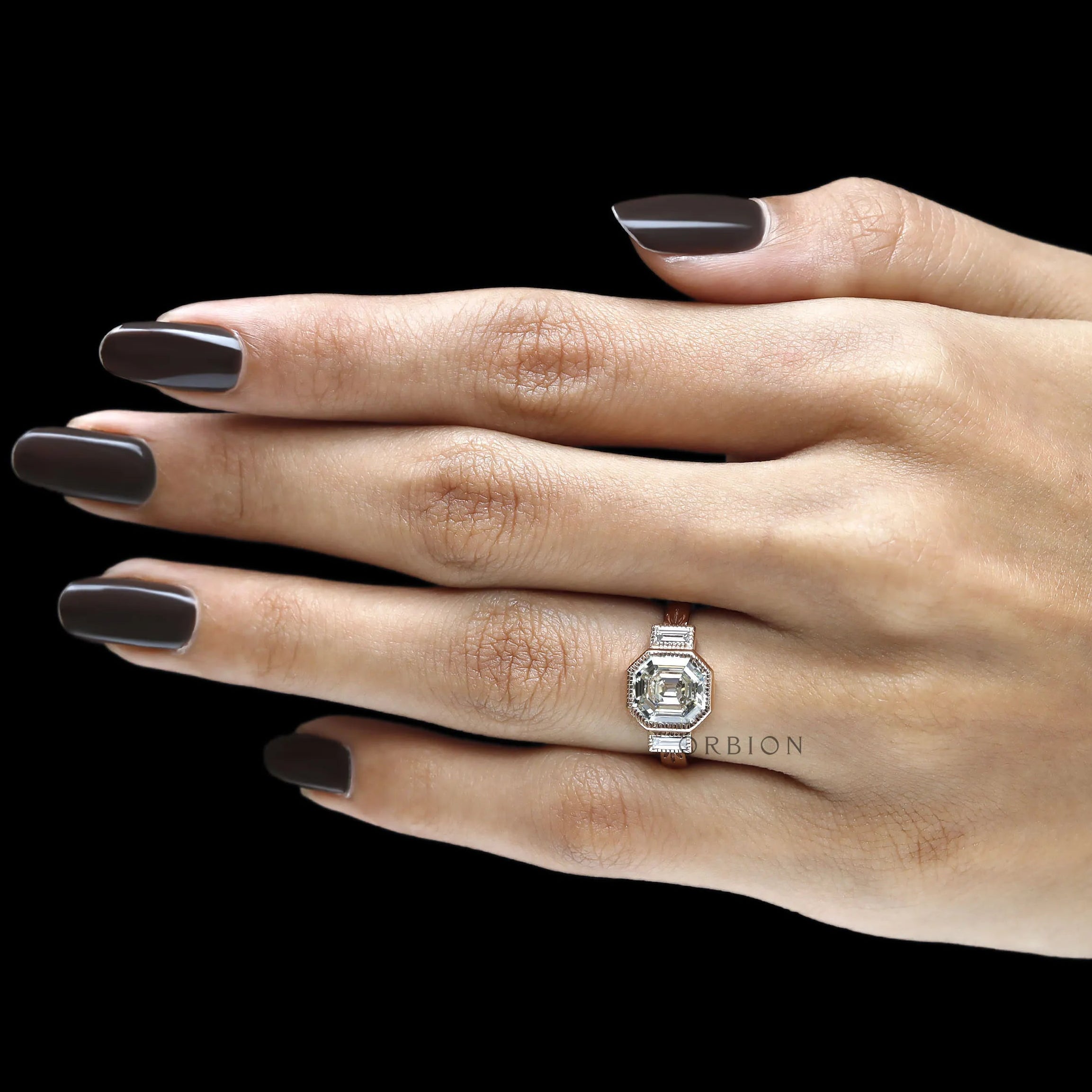 18k rose gold three stone engagement ring with bezel set elongated asscher lab diamond