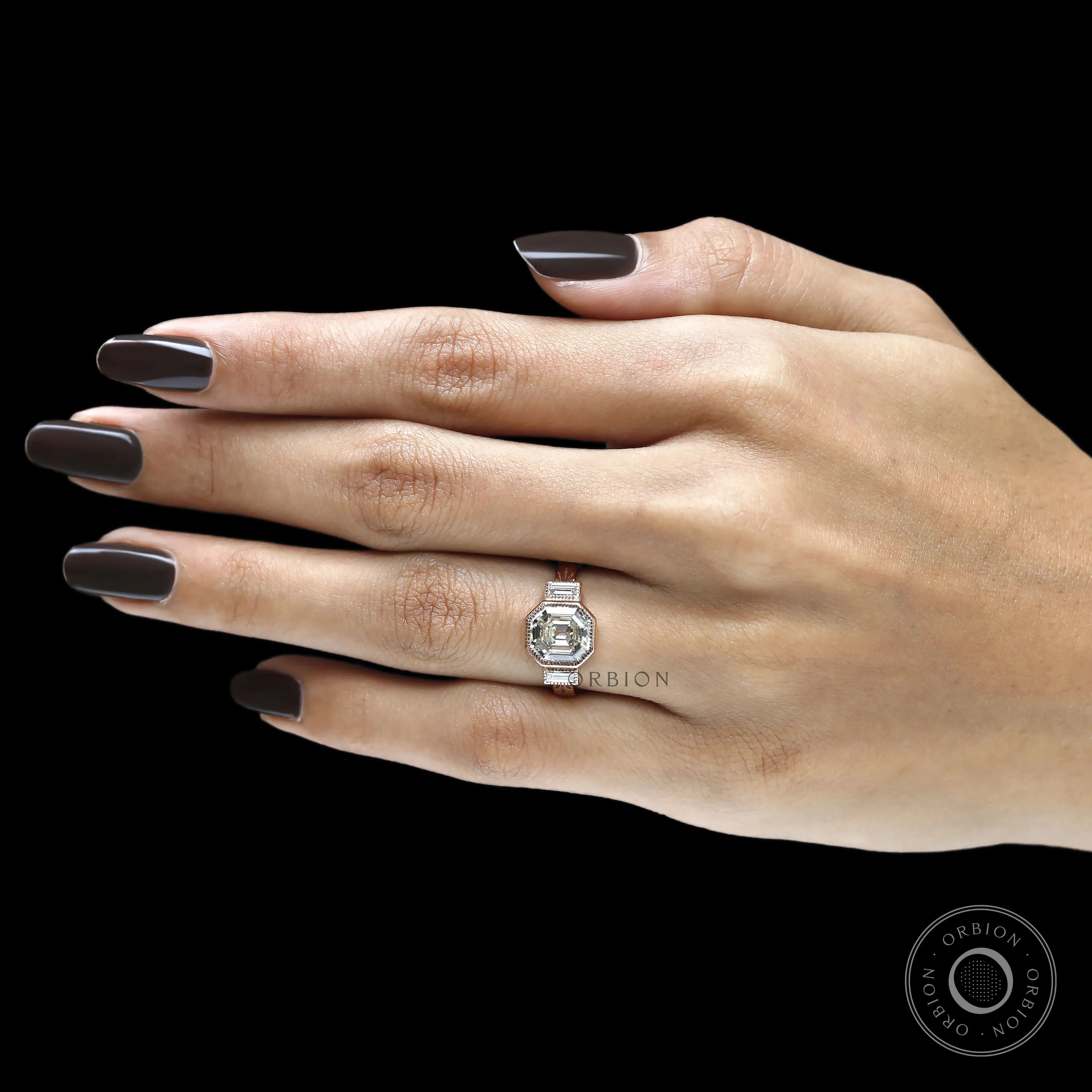 18k rose gold three stone engagement ring with bezel set elongated asscher lab diamond