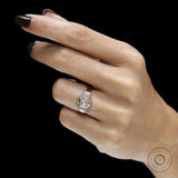 Geometric art deco engagement ring with asscher cut center and baguette accent stones