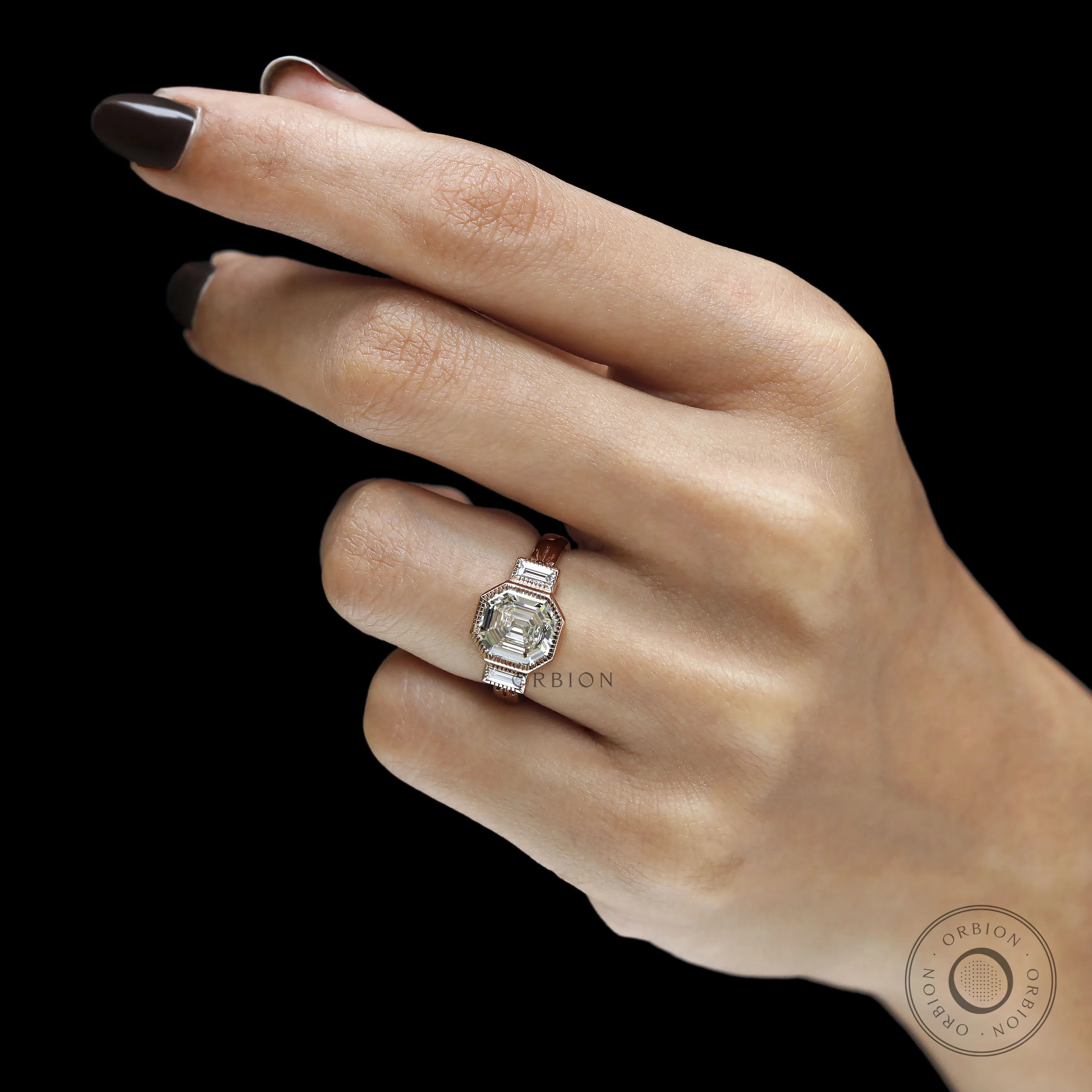 Geometric art deco engagement ring with asscher cut center and baguette accent stones