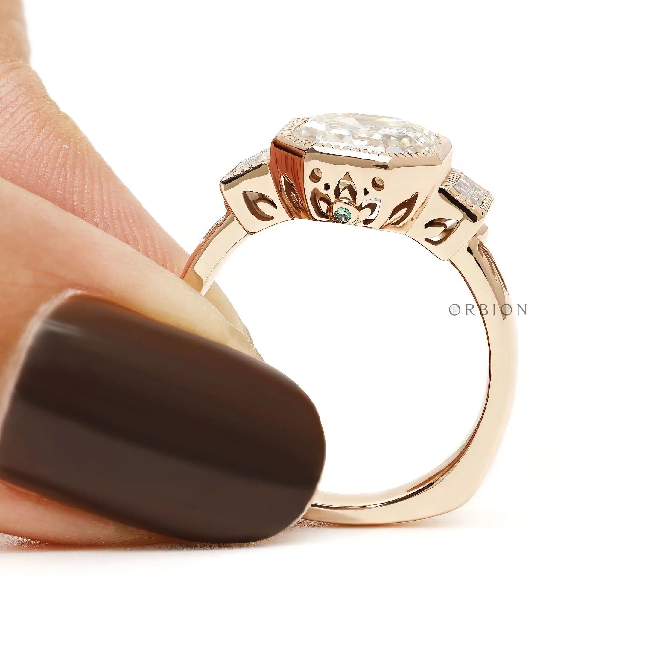 Vintage inspired asscher cut engagement ring with baguette diamonds in 18k rose gold